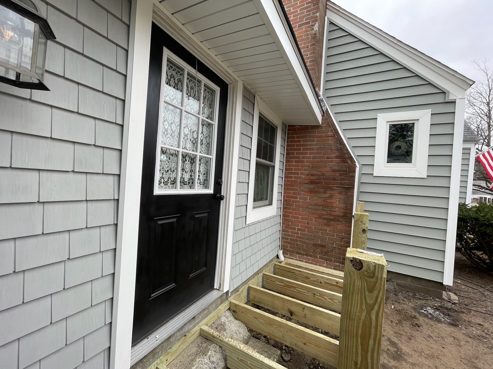 Cedar-shake siding installed by Igor's Construction on a Worcester-area home