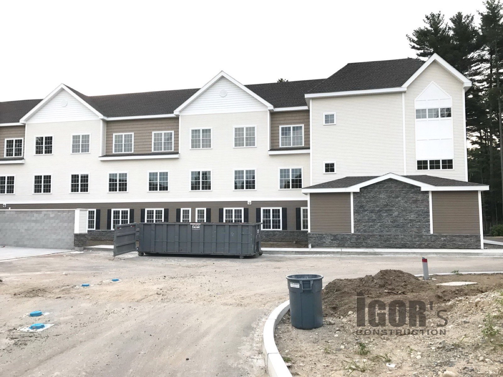 Multi-family residential building with new siding and trim