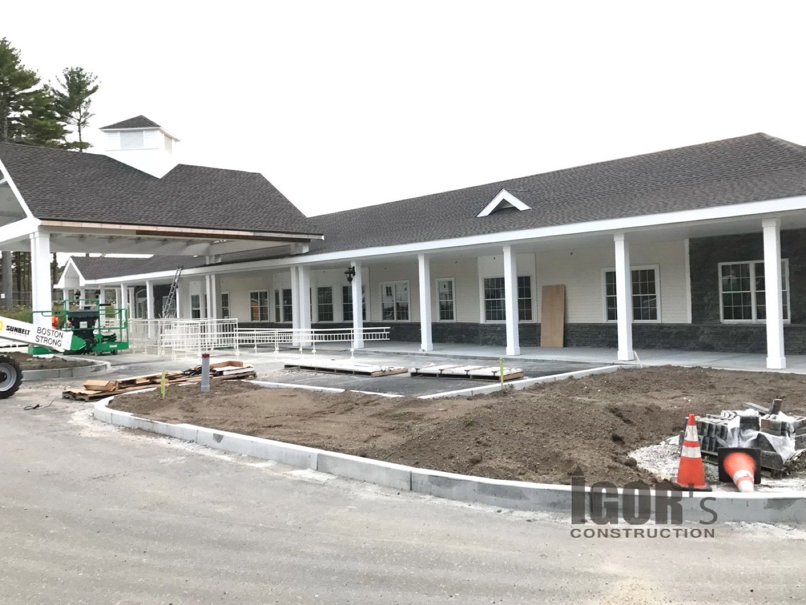 Single-story community center with columned porch