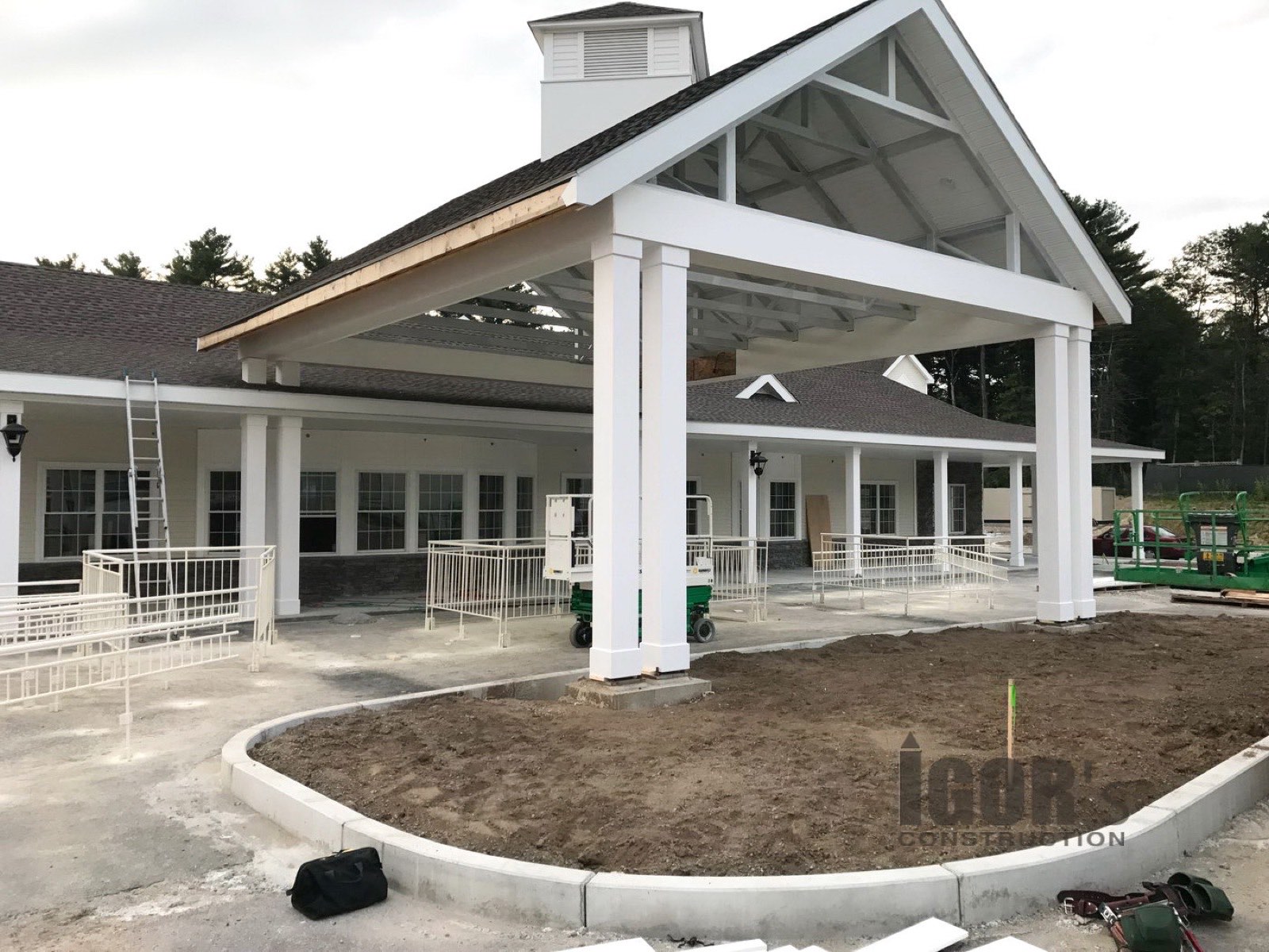 Community building with covered entry pavilion under construction
